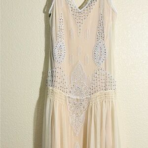 Elegant Cream Sleeveless Dress